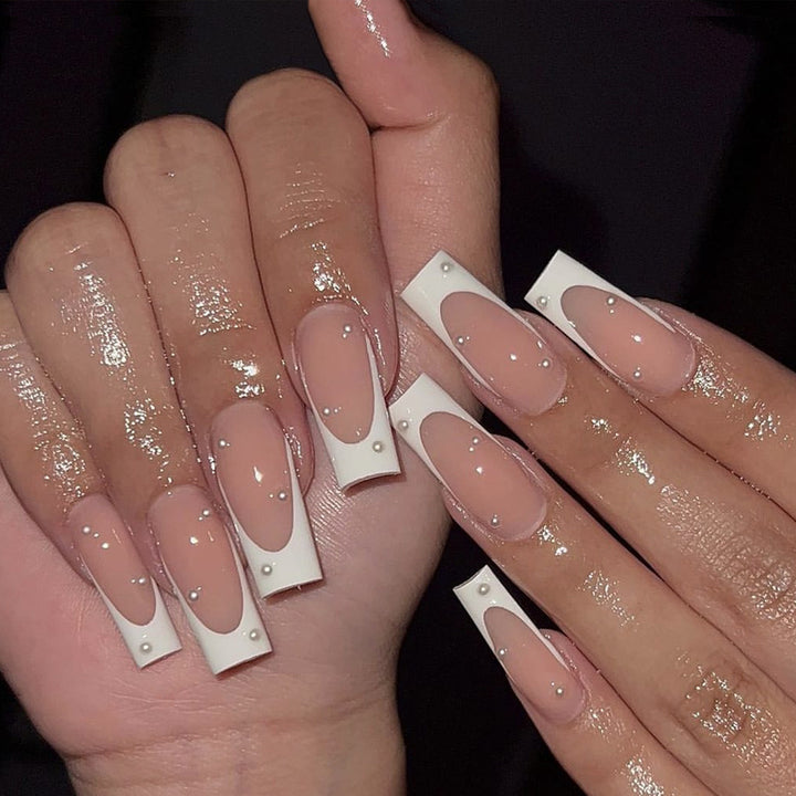 Artificial nail tips with elegant pearl accents Stornfield