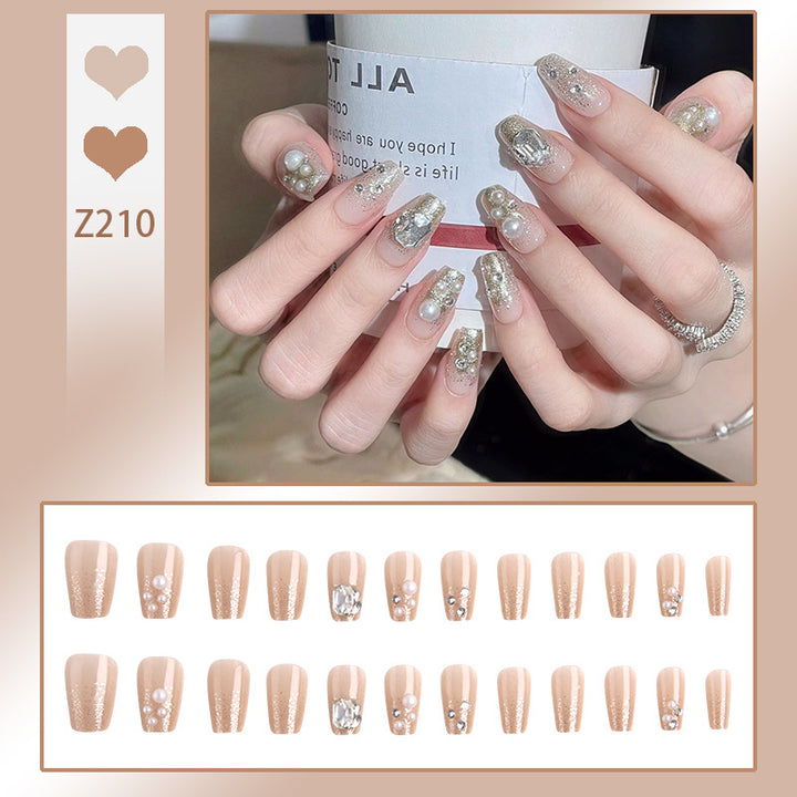 Artificial nail set with elegant pearl and glitter design Stornfield