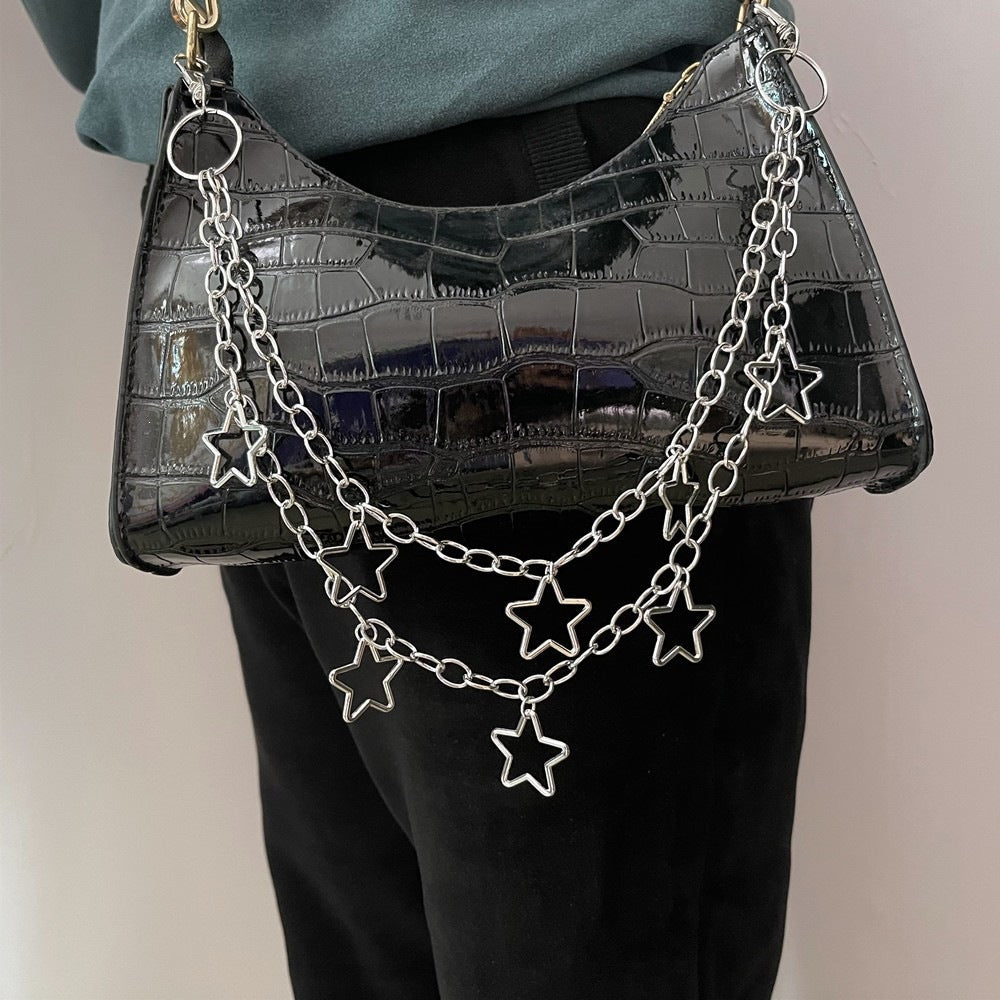 Fashionable chain belt with star pendants Stornfield