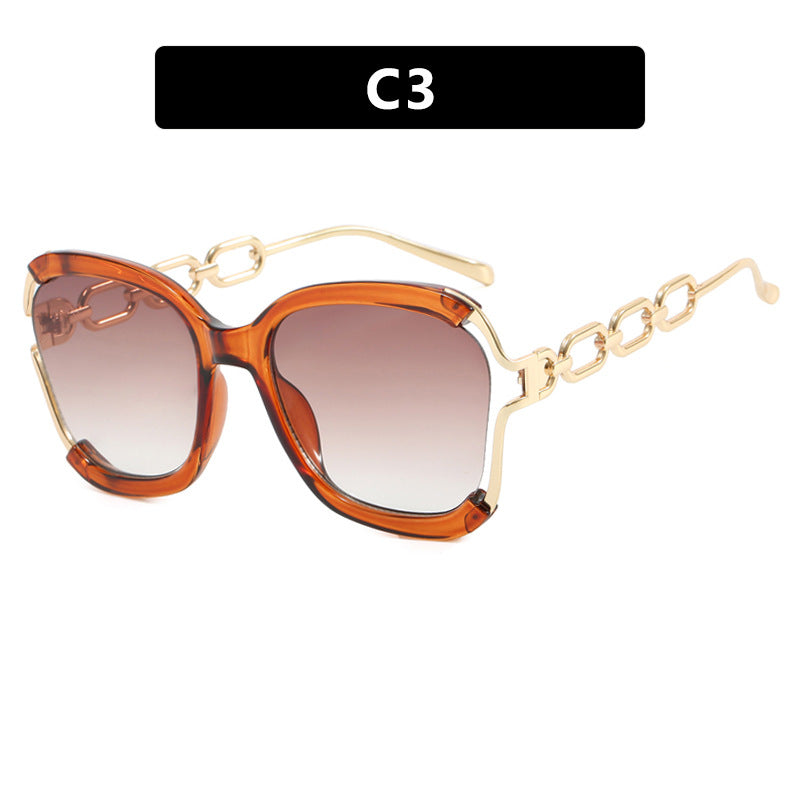 Ladies fashionable sunglasses with golden chain details Stornfield