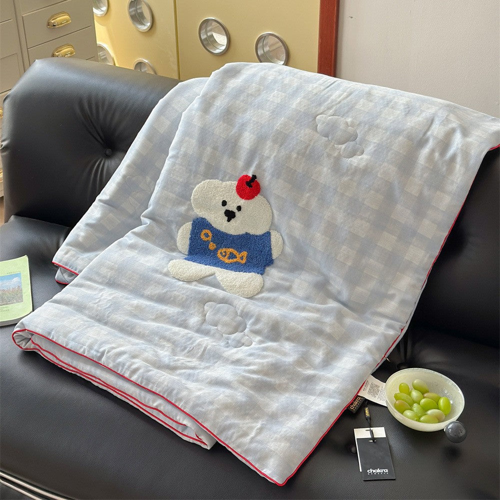 Children's cuddle blanket quilted with 3D teddy appliqué and muslin surface