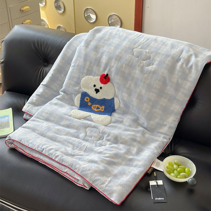 Children's cuddle blanket quilted with 3D teddy appliqué and muslin surface