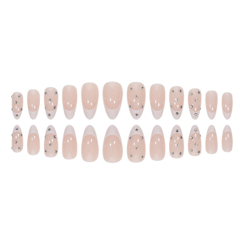 Elegant Stiletto Nail Extensions with Rhinestone Accents Stornfield