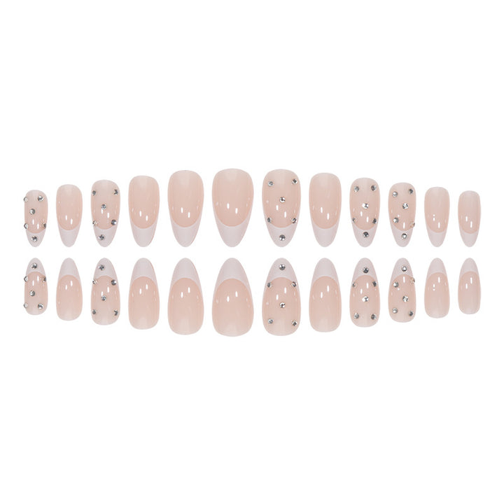 Elegant Stiletto Nail Extensions with Rhinestone Accents Stornfield