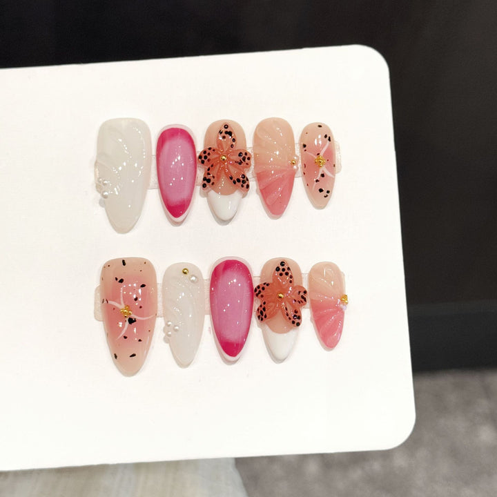 Decorative Press-On Nail Art Set with Floral and Whimsical Designs