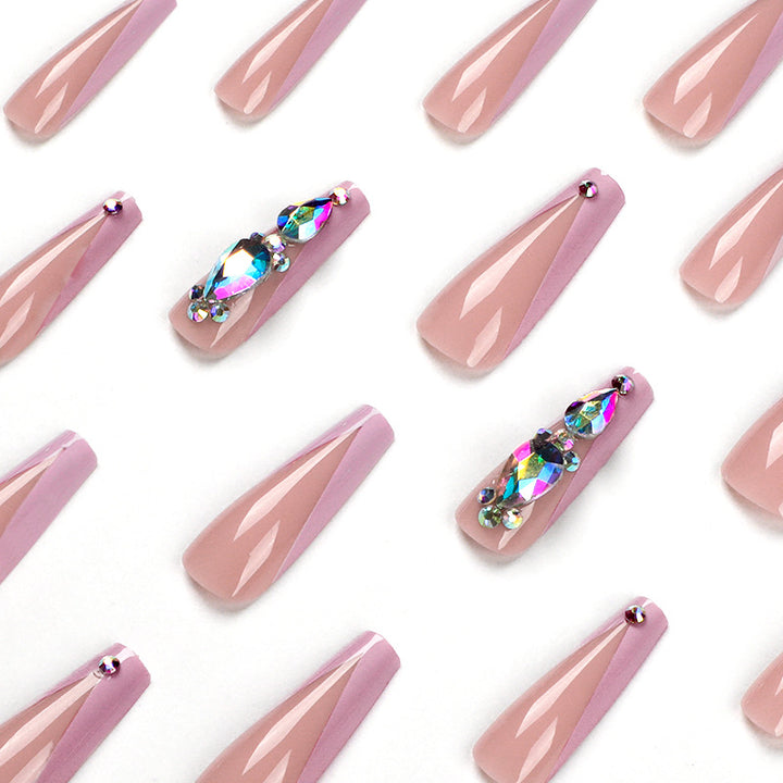 Artful nail extensions with rhinestone and flower accents Stornfield