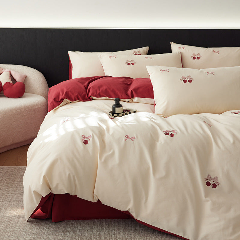 Luxurious cotton bedding set with cherry embroidery and reversible design