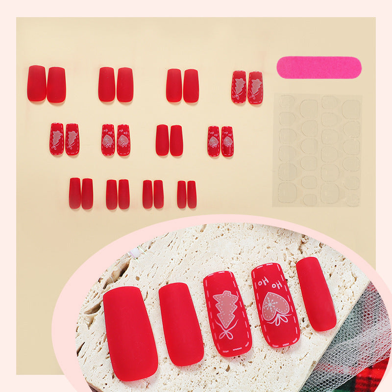 Christmas nail art set with festive motifs and glitter accents Stornfield