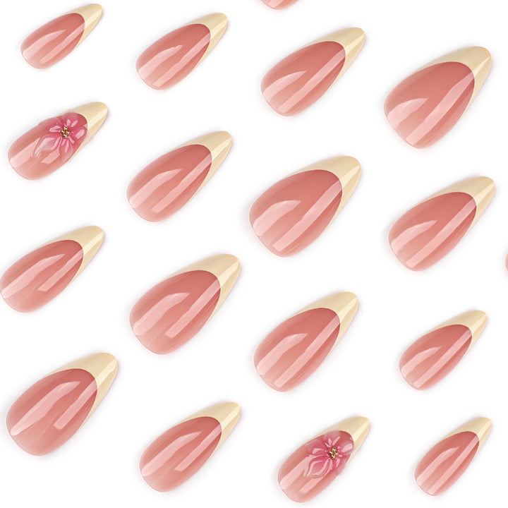 Artful stiletto nails with elegant flower accent Stornfield