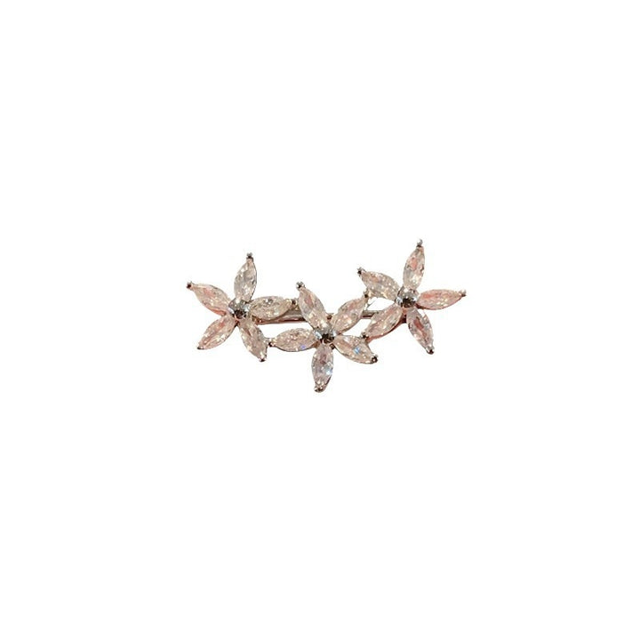 Flower brooch made of radiant gemstones Stornfield