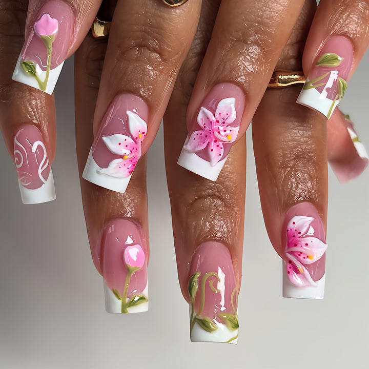 Artificial nails with handcrafted floral designs Stornfield