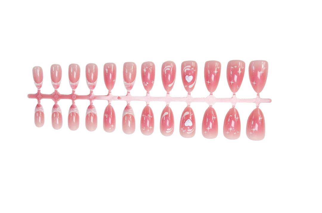 Acrylic nail set with romantic heart design and glitter accents Stornfield
