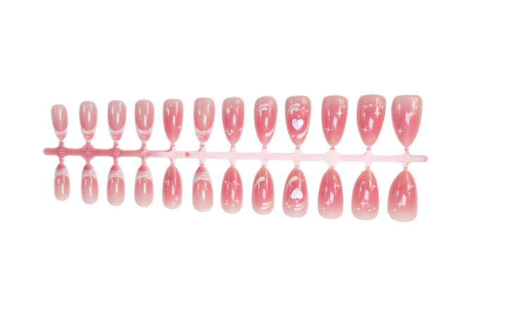 Acrylic nail set with romantic heart design and glitter accents Stornfield