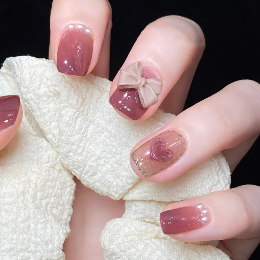 Artful nail extensions with an elegant leaf pattern Stornfield