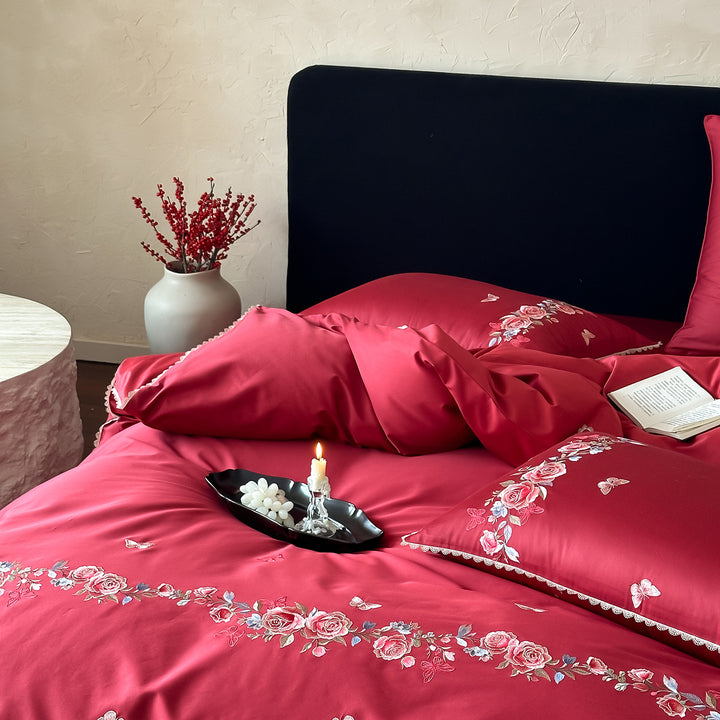 Elegant satin bedding set with fine floral embroidery and reversible design