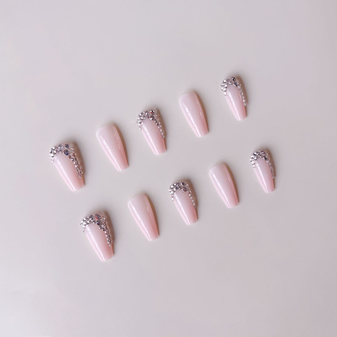 Artificial nail set with glamorous rhinestone embellishments Stornfield