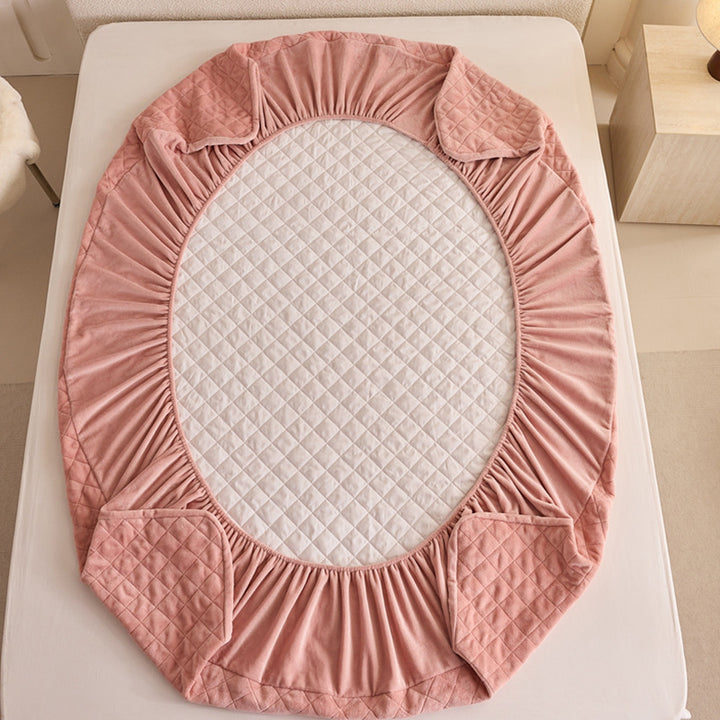 Quilted mattress protector with non-slip bottom and soft microfiber cover