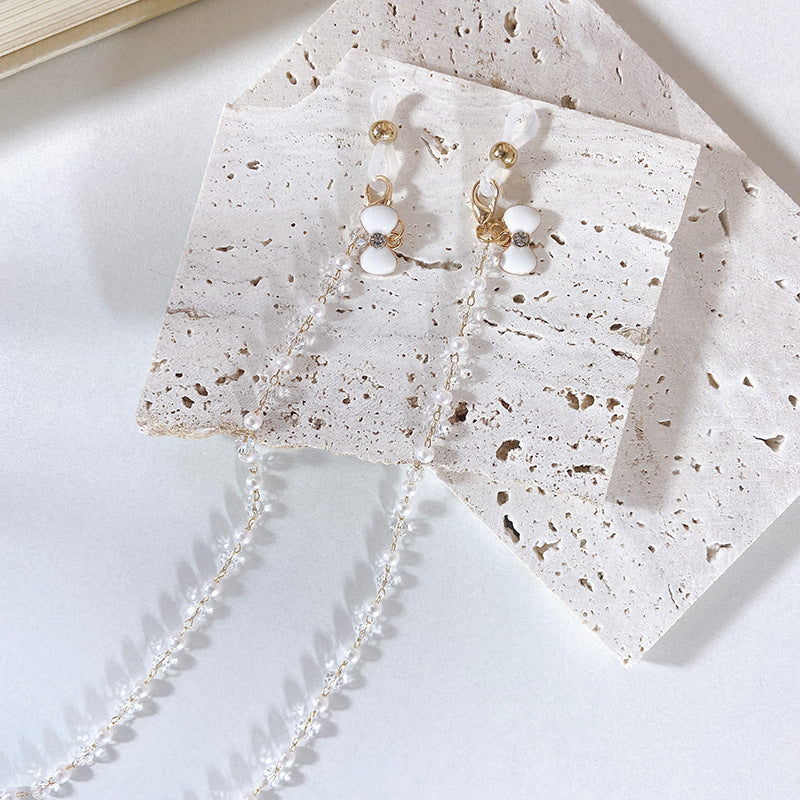 Elegant earrings with pearls and flower pendants Stornfield