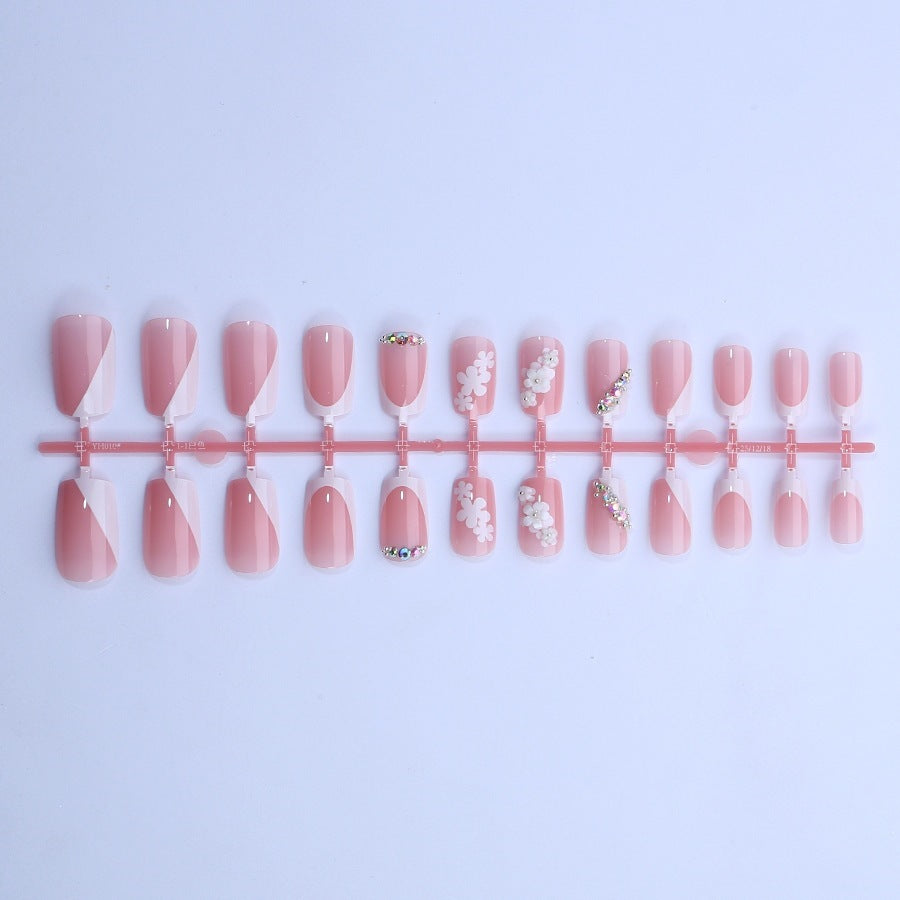 Artificial nail set with flower and glitter details Stornfield