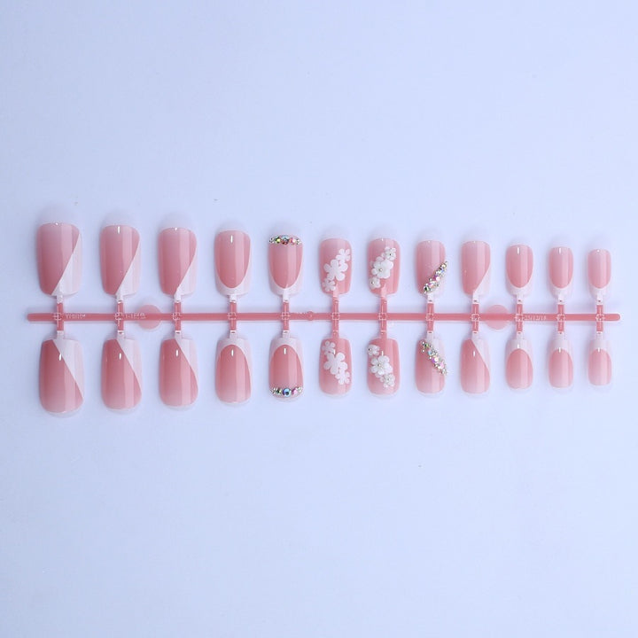 Artificial nail set with flower and glitter details Stornfield