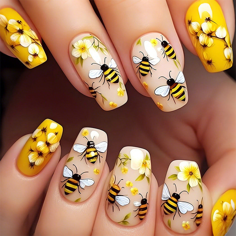 Artificial nail set with floral and bee motifs Stornfield