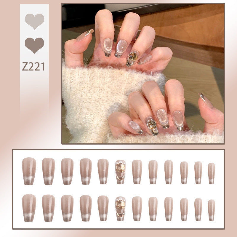 Artificial nail set with glamorous gold and glitter accents Stornfield