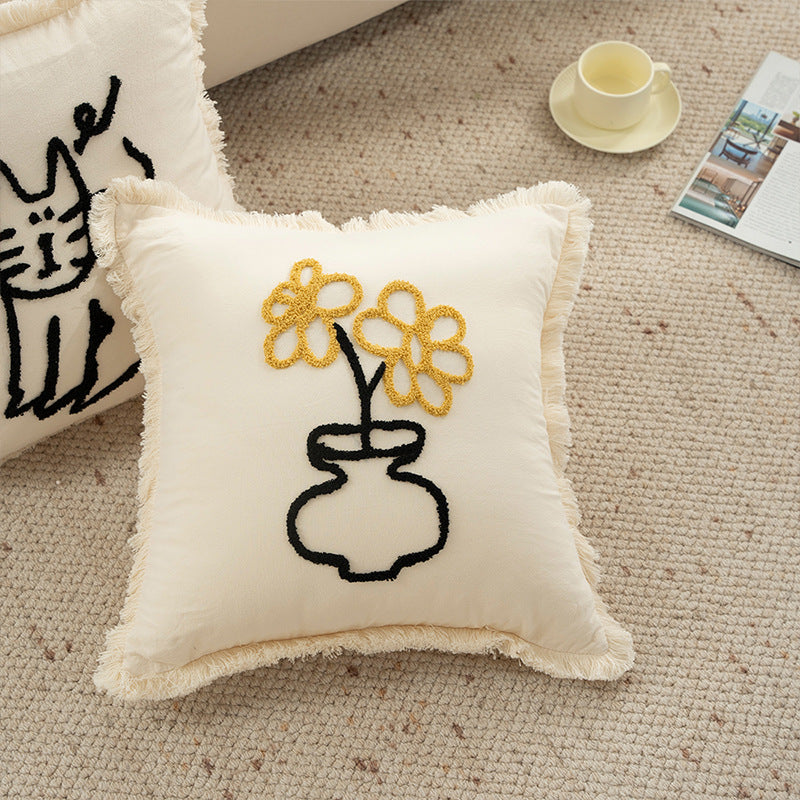 Decorative pillowcase with embroidered café motif, fringed edge, and concealed zipper