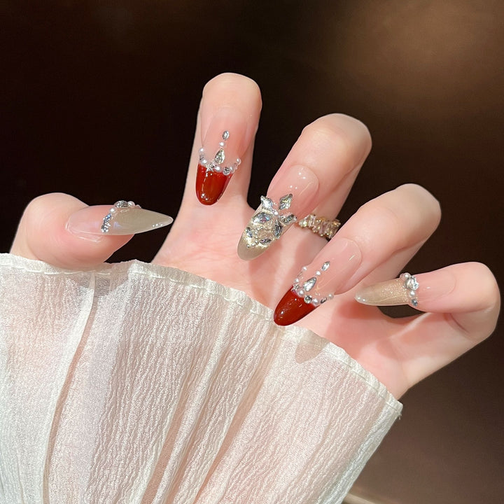 Elegant Nail Art Extensions with Pearl Accents Stornfield