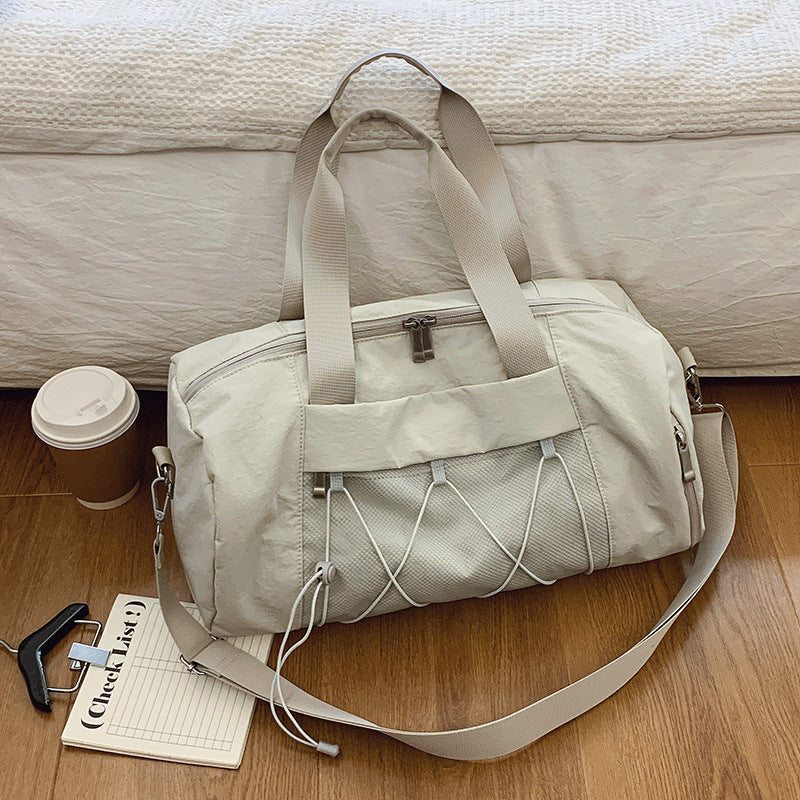 Sporty shoulder bag with adjustable carrying handles and breathable mesh material Stornfield