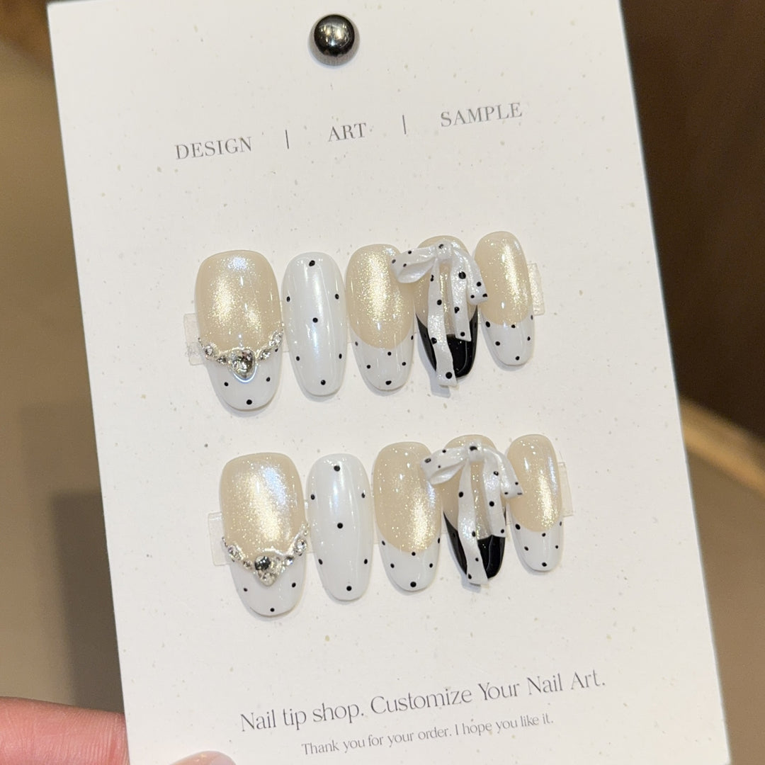 Artificial nails with glitter and bows Stornfield