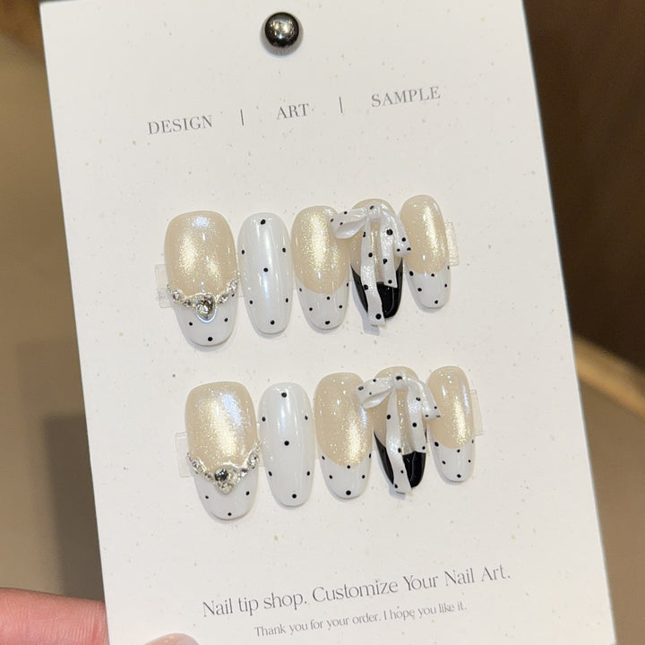 Artificial nails with glitter and bows Stornfield