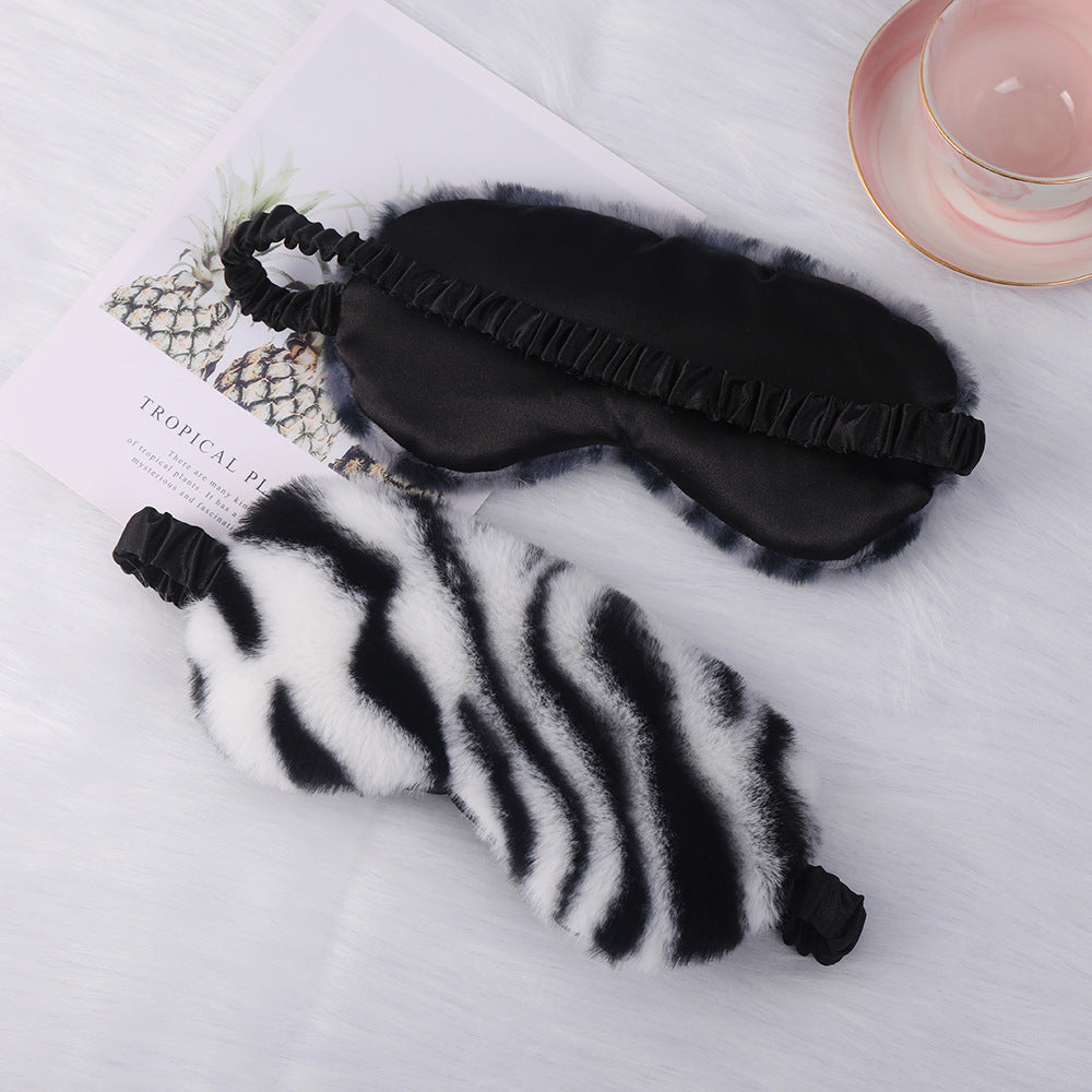 Women's luxury faux fur sleep mask with leopard print, extra soft padding and elastic comfort band Stornfield