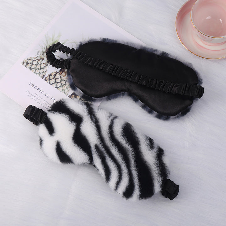 Women's luxury faux fur sleep mask with leopard print, extra soft padding and elastic comfort band Stornfield