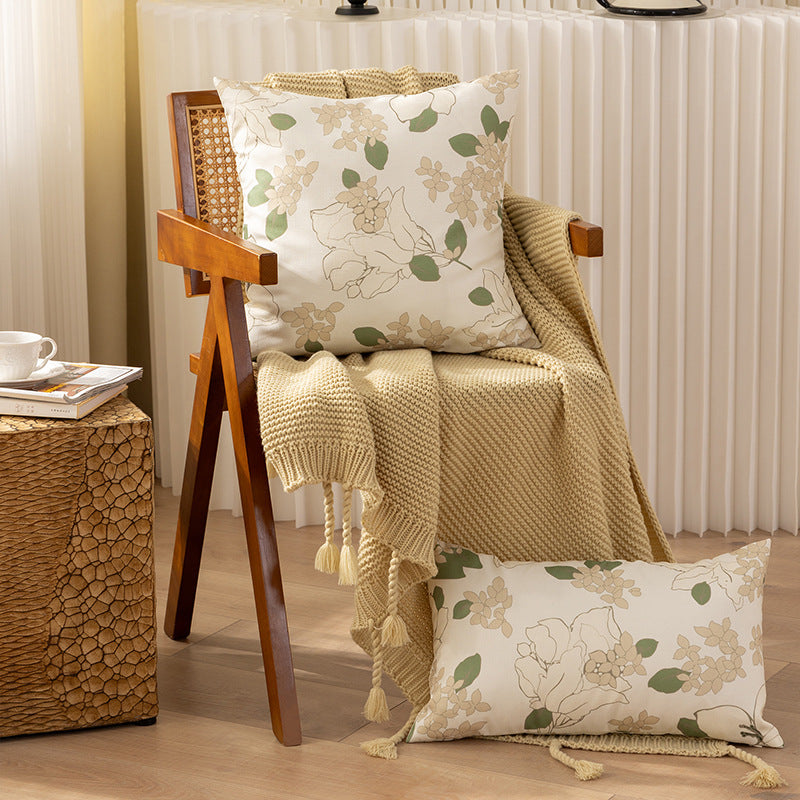 Rectangular decorative cushion with sketchy floral print and fine linen look