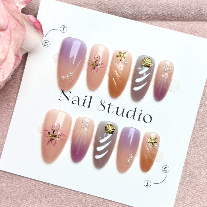 Artistic Press-On Nail Art Set with Floral and Gem Details