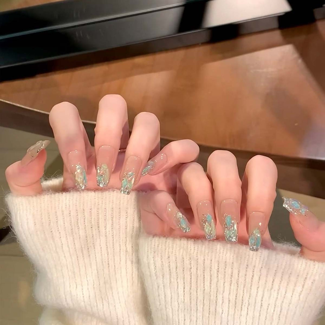Glamorous nail tips with glitter accents Stornfield