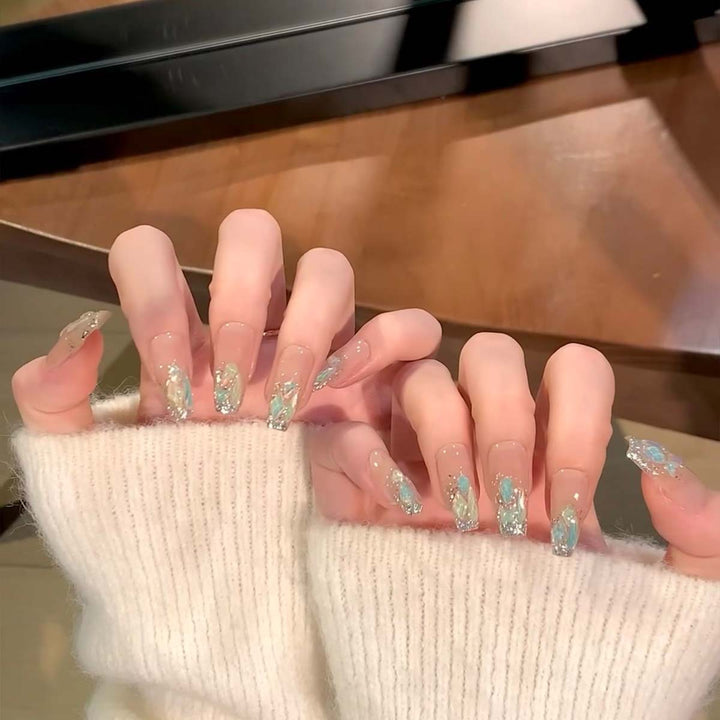 Glamorous nail tips with glitter accents Stornfield