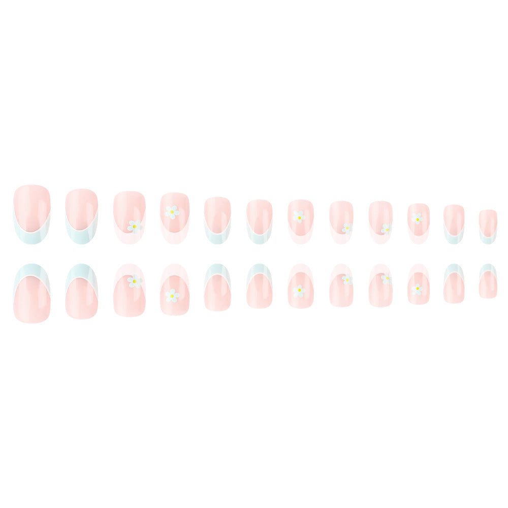 Elegant French Tip Press-On Nails with Floral Accents Stornfield