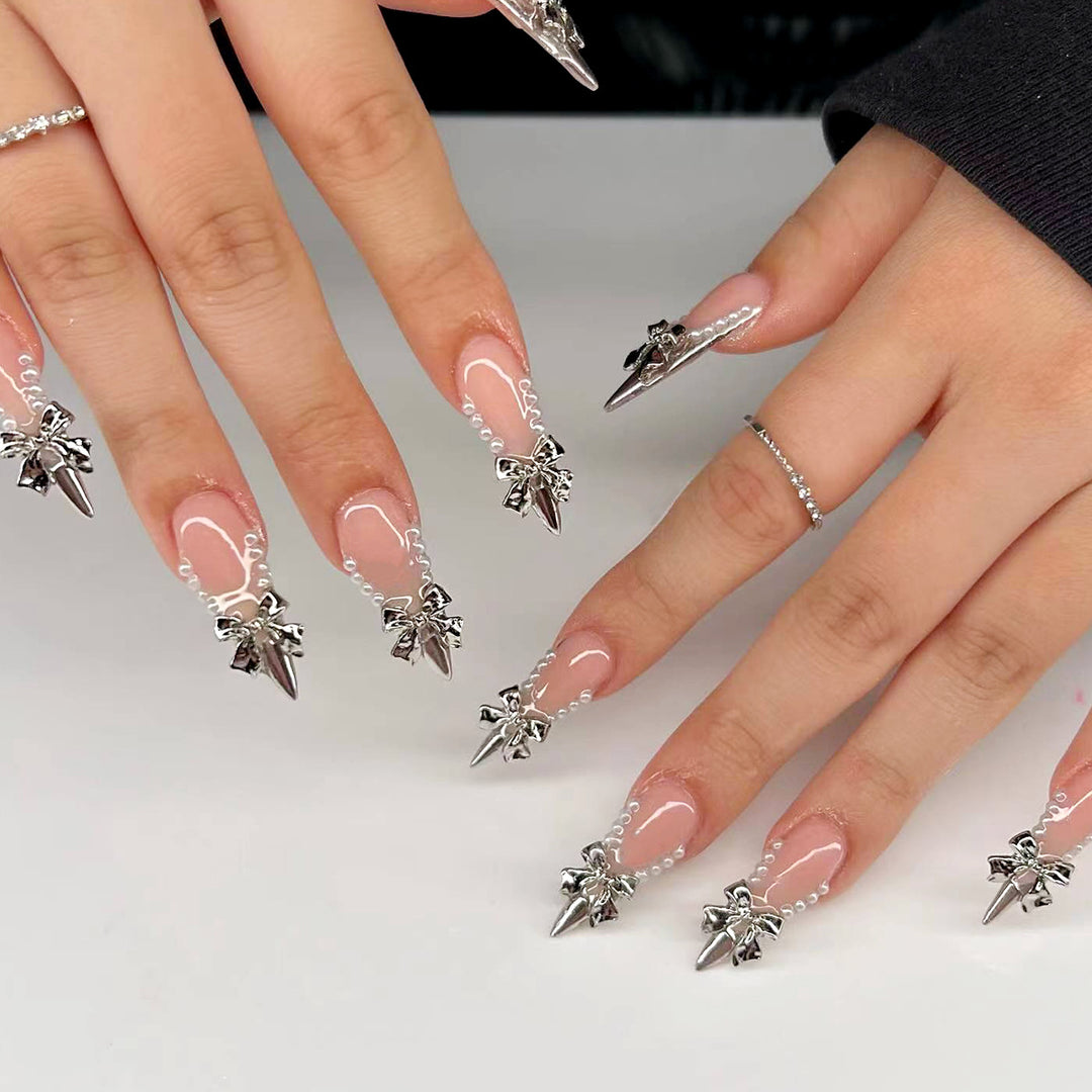 Glamorous artificial nails with decorative accents Stornfield