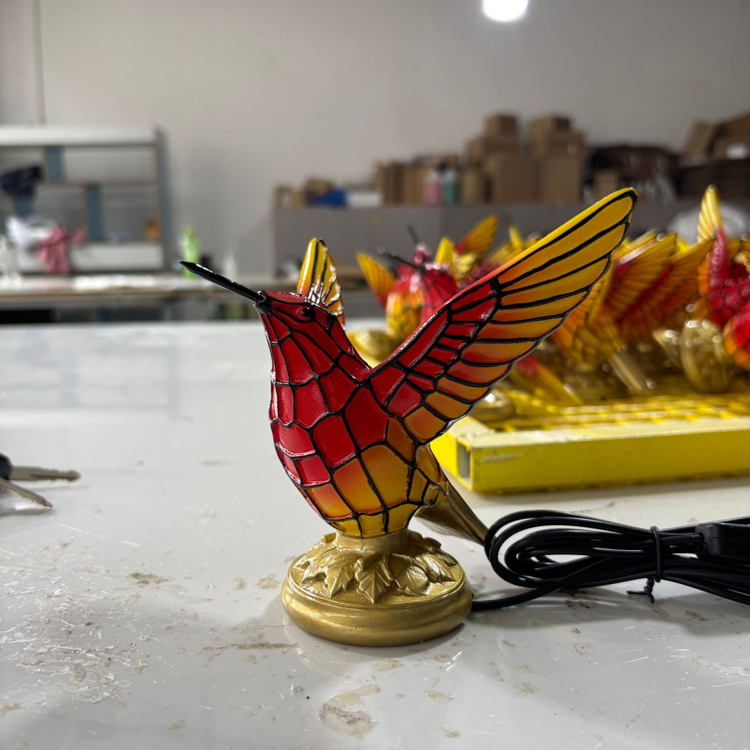 Decorative table lamp in the shape of a hummingbird Stornfield