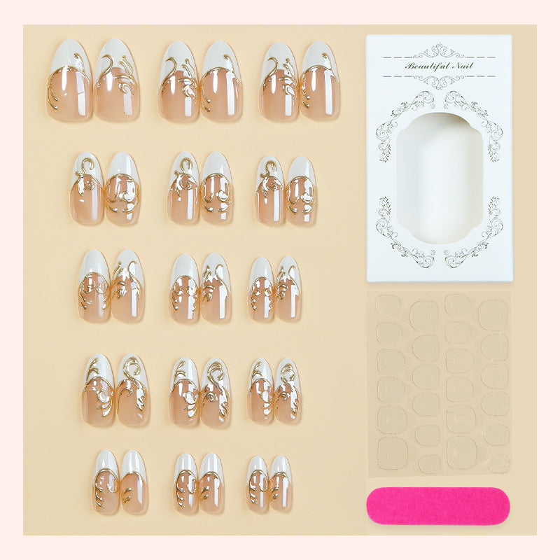 Acrylic nail set with elegant golden decorations Stornfield