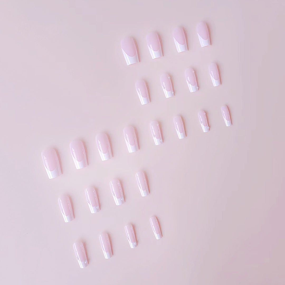 Artificial nail tips with elegant pearl accents Stornfield