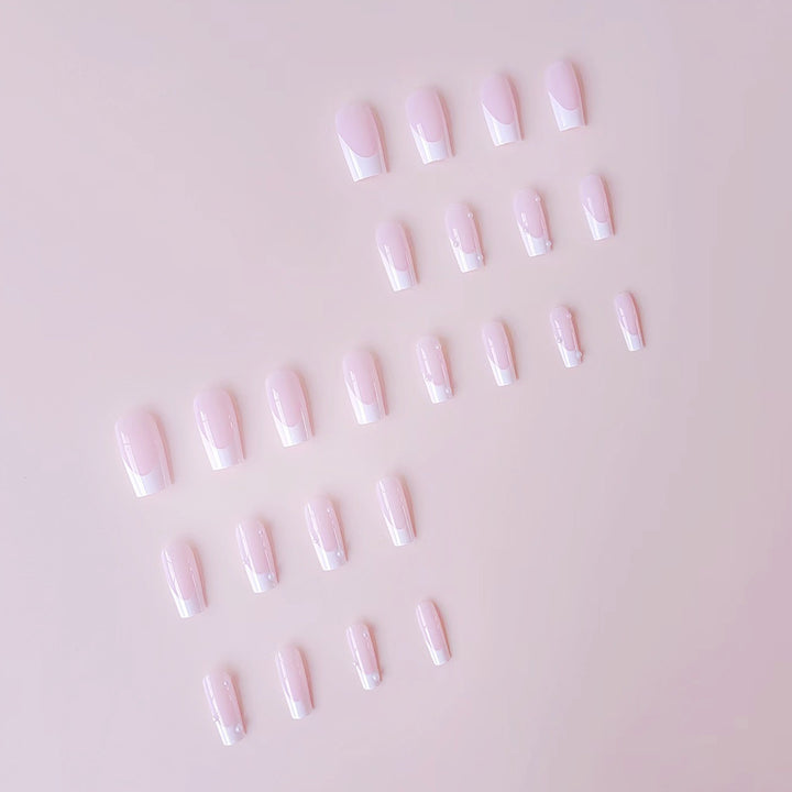 Artificial nail tips with elegant pearl accents Stornfield