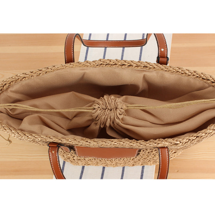 Braided bast bag with leather application Stornfield