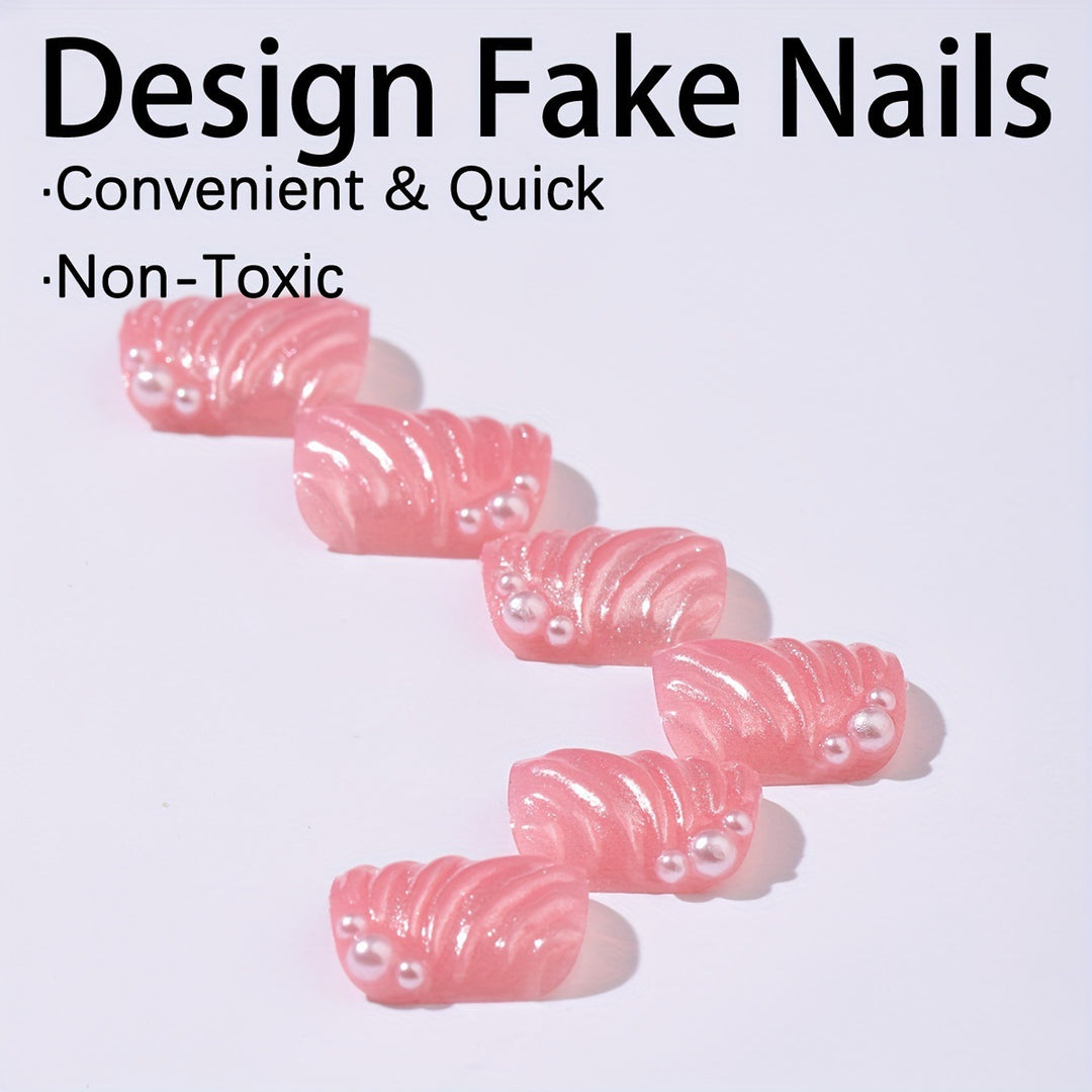 Nail art set with elegant shell designs and glitter accents Stornfield