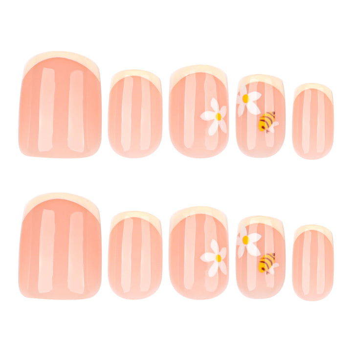 Artificial nail art with flower and bee motifs Stornfield