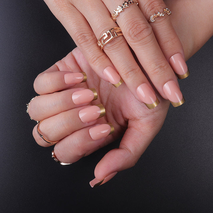 Elegant French Tip Press-On Nails with Gold Accent Stornfield