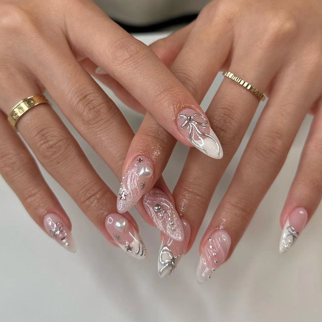 Artful stiletto nails with elegant decoration Stornfield