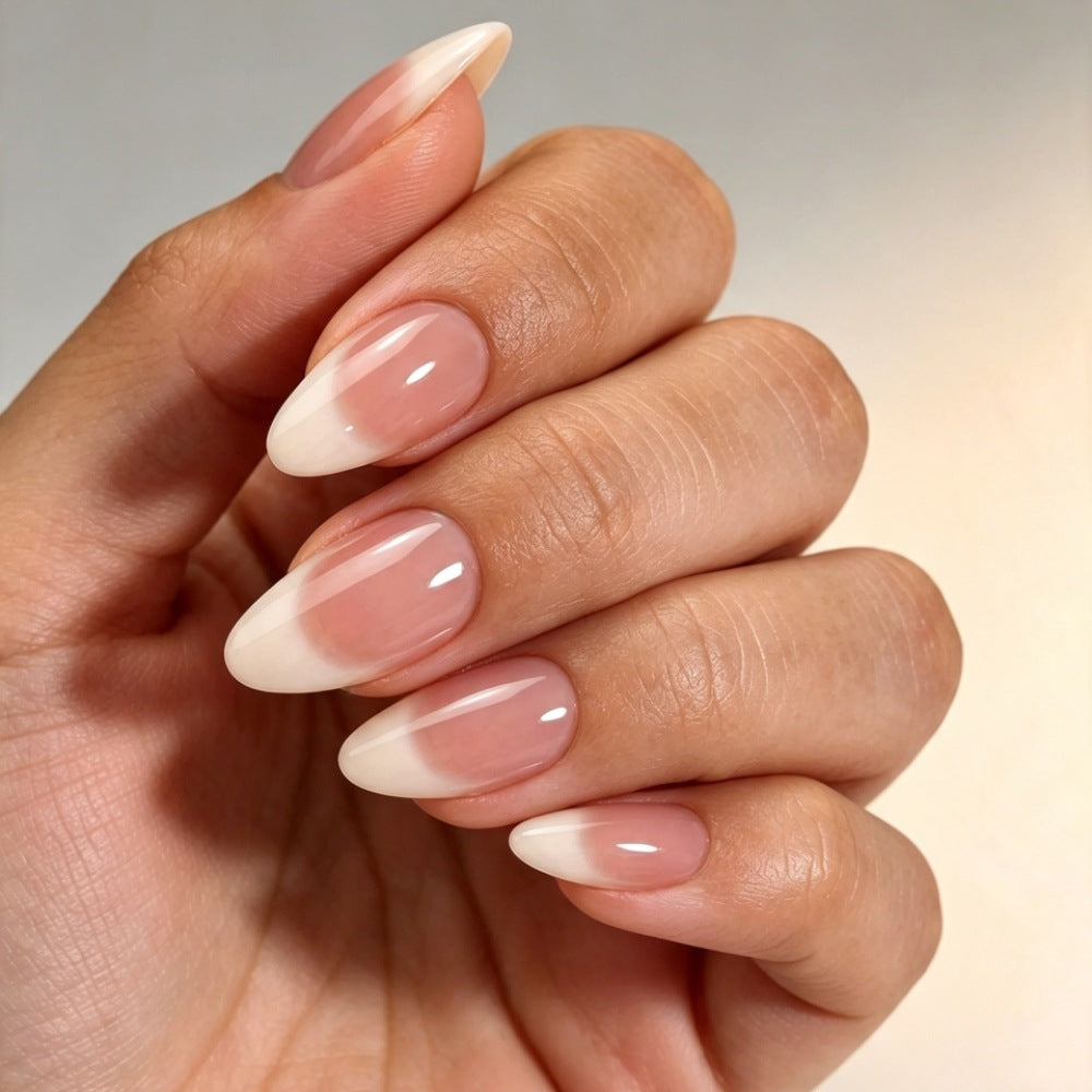 Artificial nails with elegant nude ombre design Stornfield