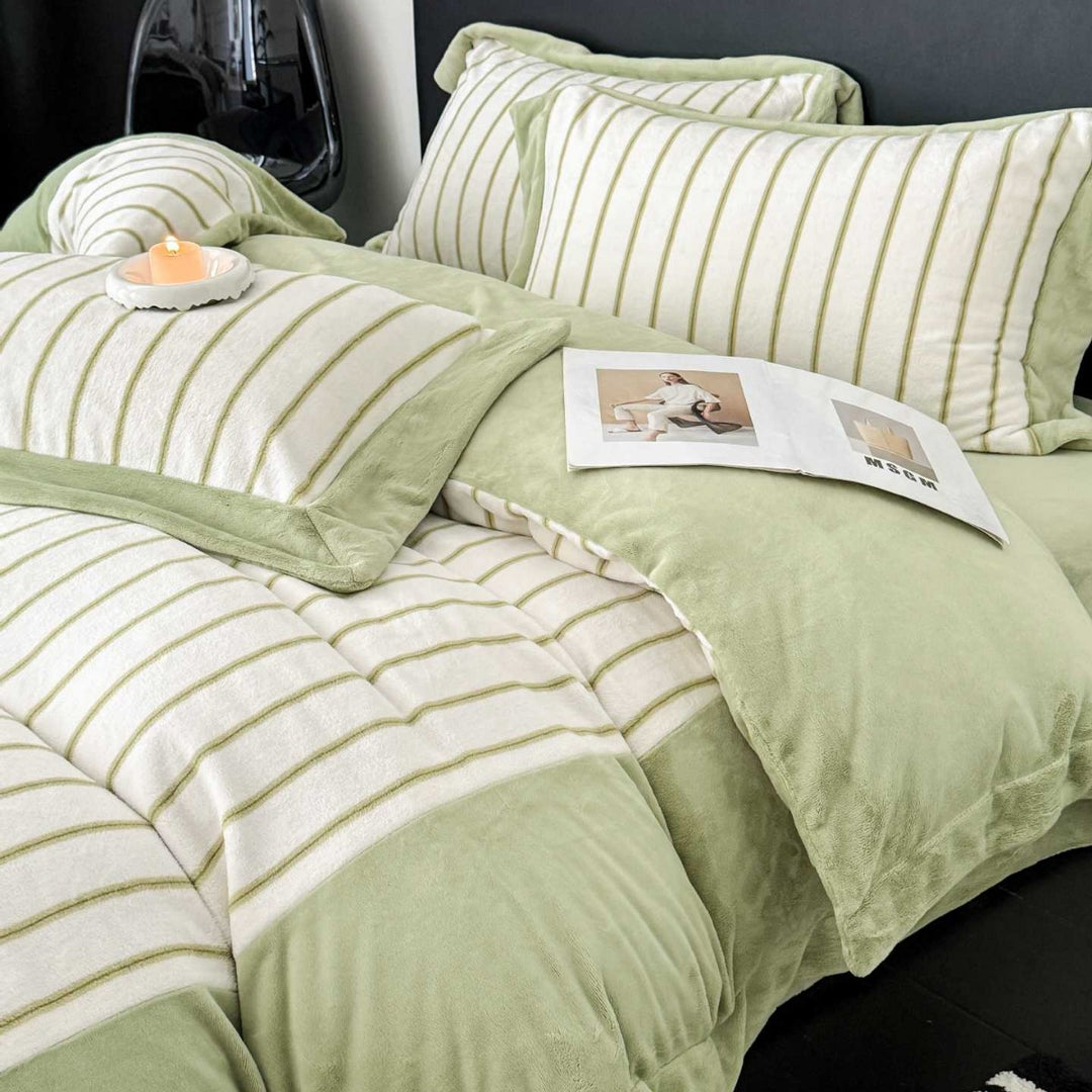 Luxurious bedding set made of striped cotton blend with velvet trim and reversible function